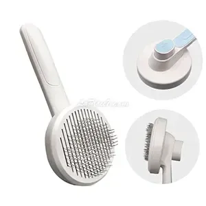 Brosse pour chat ronde avec bouton de nettoyage